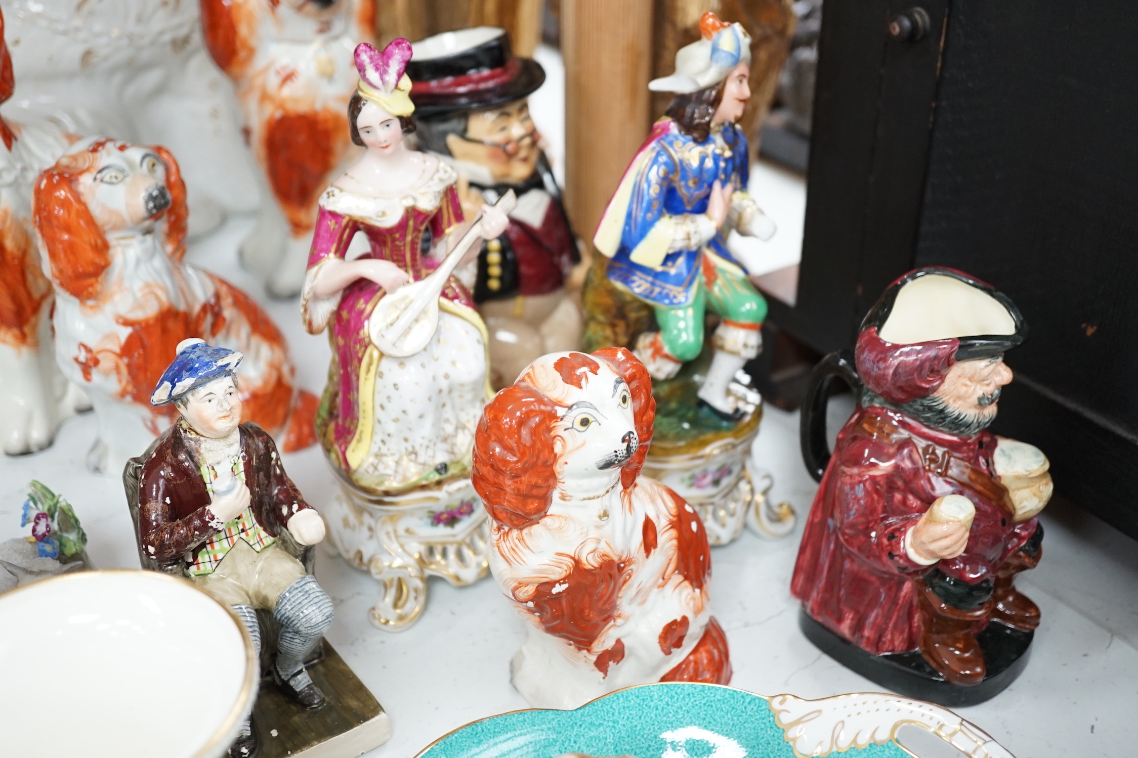 19th century and later porcelain and ceramics including Staffordshire comforter spaniels, Doulton Toby jugs, Coalport dish and Limoges enamel vase